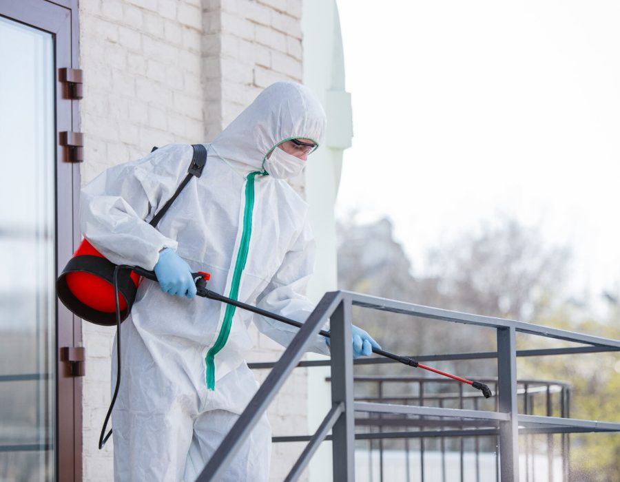 coronavirus-pandemic-disinfectant-protective-suit-mask-sprays-disinfectants-room_155003-4342